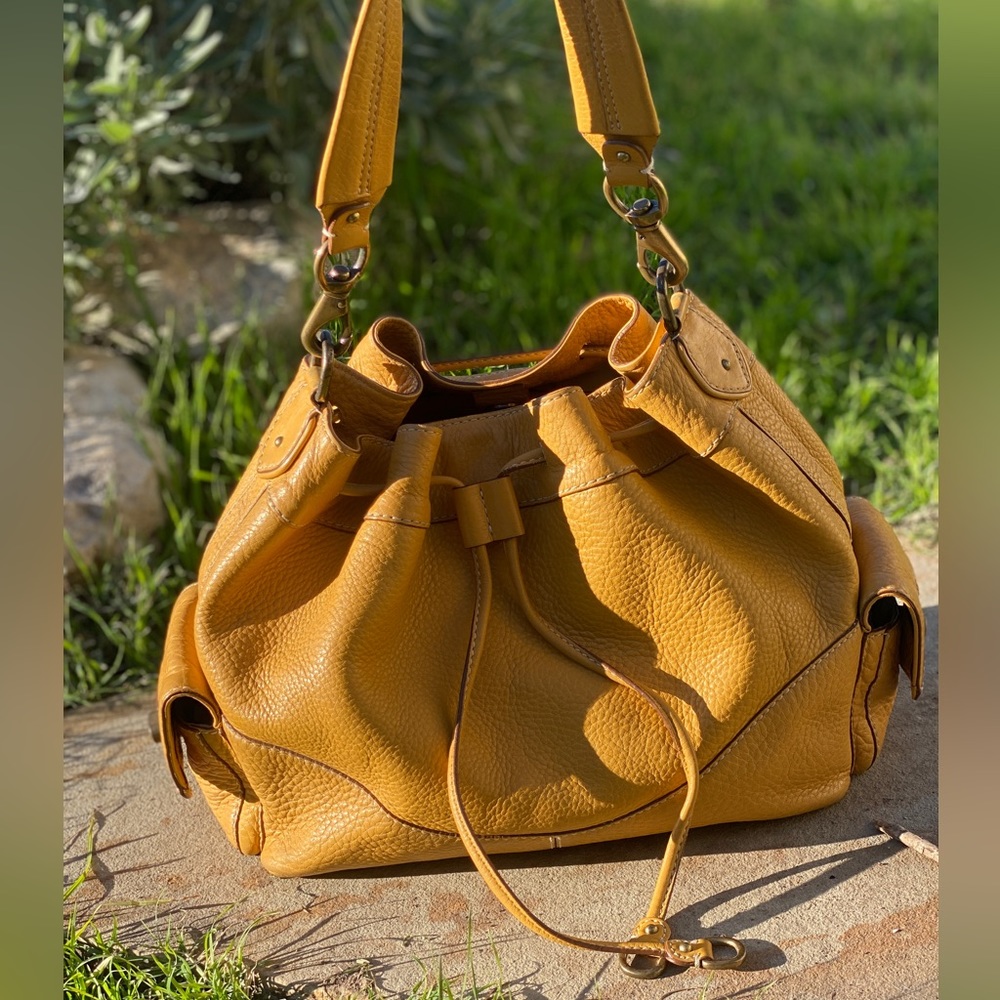 Cole Haan mustard bucket bag pebbled leather shoulder bag